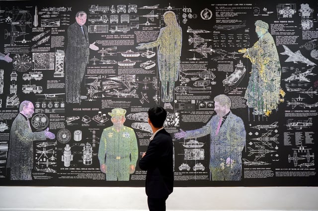 A man looks at an art installation at the exhibition titled ‘Constellation of Complicity: Visualising the Global Machinery of Authoritarian Solidarity’, at the Bangkok Arts and Cultural Centre (BACC) in Bangkok, Thailand, August 7, 2025. REUTERS/Athit Perawongmetha