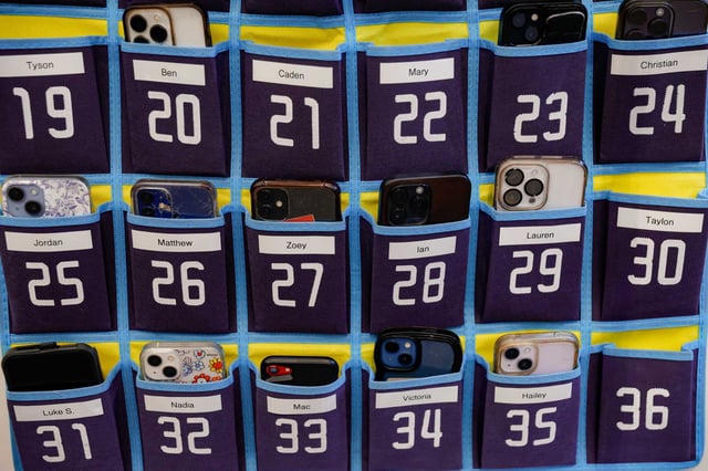 Houston ISD and more than 5 million of Texas&#39; public and charter school students will return to school screen-free this school year as a new cellphone ban comes into effect statewide. Labeled cellphone pouches were in use by students at Reagan High School theater on Monday, Sept. 9, 2024, in San Antonio. 