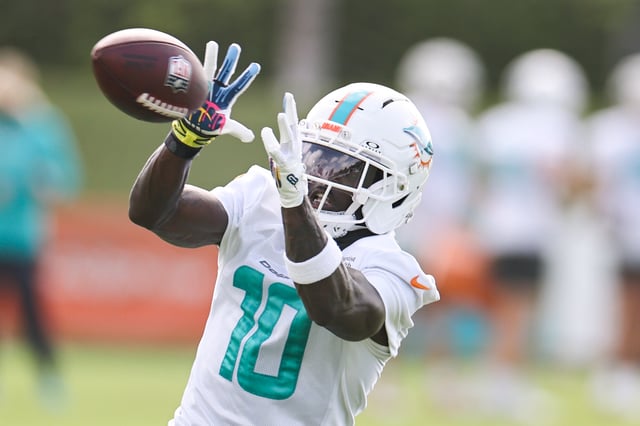 MIAMI GARDENS, FLORIDA - JULY 25: Tyreek Hill #10 of the Miami Dolphins practices at Baptist Health Training Complex on July 25, 2025 in Miami Gardens, Florida.