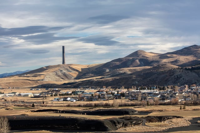 A view of the town of Anaconda, Montana in 2019. The Anaconda Smelter, which was in operation for 97 years before closing in 1980 looms in the background. A golf course has been built on top of the black slag piles in the foreground, which contain toxic metals such as arsenic and lead. Residents of the neighboring town of Opportunity, which sits directly downwind from the smelter operation, are plaintiffs in a lawsuit against giant ARCO for insifficient clean up of toxic materials on their properties.