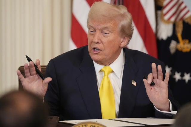 President Donald Trump speaks as he signs a proclamation declaring National Purple Heart Day in the East Room of the White House, Thursday, Aug. 7, 2025, in Washington. (AP Photo/Mark Schiefelbein)