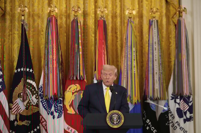 President Donald Trump speaks at an event to mark National Purple Heart Day in the East Room of the White House, Thursday, Aug. 7, 2025, in Washington. (AP Photo/Mark Schiefelbein)