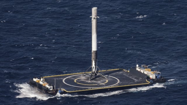 SpaceX's ASDS drone ship transporting a Falcon 9 first stage.