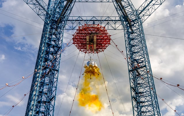 In this photo provided by the China Manned Space Agency on August 7, 2025, China&#39;s manned lunar lander conducts a landing and takeoff test at a test site in Huailai County, in Hebei Province, North China.