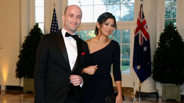 Stephen Miller, then-President Donald Trump&#39;s White House senior adviser, left, and Katie Miller arrive for a state dinner at the White House in 2019. Katie Miller has announced she is lauching a podcast. (PATRICK SEMANSKY/AP FILE)