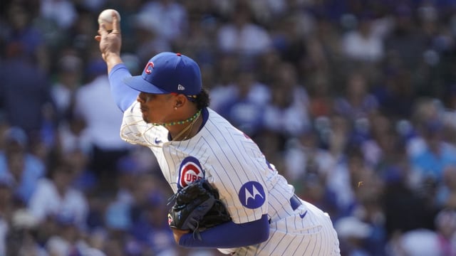 Aug 6, 2025; Chicago, Illinois, USA; Chicago Cubs pitcher Daniel Palencia (48) throws the ball against the Cincinnati Reds during the ninth inning at Wrigley Field. Mandatory Credit: David Banks-Imagn Images