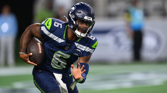 Aug 7, 2025; Seattle, Washington, USA; Seattle Seahawks quarterback Jalen Milroe (6) carries the ball against the Las Vegas Raiders during the second half at Lumen Field. Mandatory Credit: Steven Bisig-Imagn Images