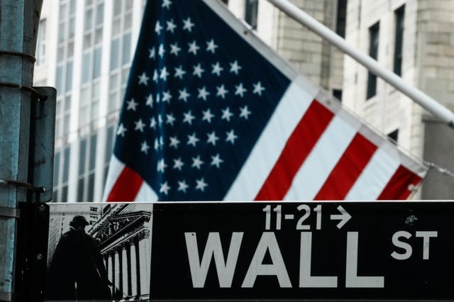 A street sign is seen near the New York Stock Exchange (NYSE) in New York City, New York, U.S., August 7, 2025.  REUTERS/Eduardo Munoz