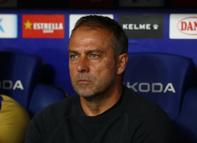 Soccer Football - LaLiga - Espanyol v FC Barcelona - RCDE Stadium, Cornella de Llobregat, Spain - May 15, 2025 FC Barcelona coach Hansi Flick looks on REUTERS/Albert Gea/File Photo