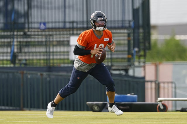 Jul 24, 2025; Lake Forest, IL, USA; Chicago Bears quarterback Caleb Williams (18) runs with the ball during training camp at Halas Hall. Mandatory Credit: Kamil Krzaczynski-Imagn Images/ File Photo