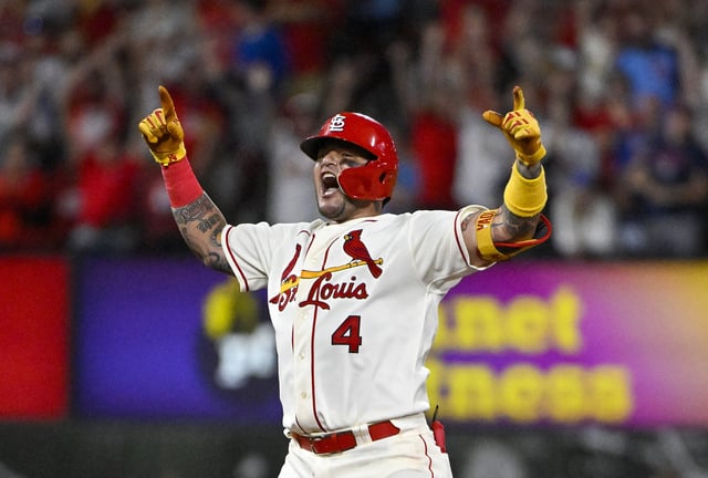 Sep 3, 2022; St. Louis, Missouri, USA;  St. Louis Cardinals catcher Yadier Molina (4) reacts after hitting a three run double against the Chicago Cubs during the third inning at Busch Stadium. Mandatory Credit: Jeff Curry-USA TODAY Sports/ File Photo