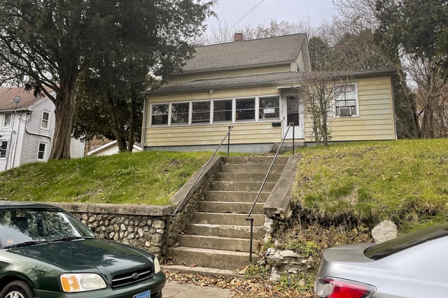 FILE - Reach House, a halfway house for sex offenders where visiting nurse Joyce Grayson was found dead, sits atop a small hill, Nov. 21, 2023, in Willimantic, Conn. (AP Photo/Pat Eaton Robb, File)