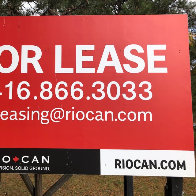 RioCan signage is shown at a strip mall in Mississauga, Ont., Saturday, Oct.24, 2020. RioCan is one of Canada's largest real estate investment trusts. THE CANADIAN PRESS/Richard Buchan