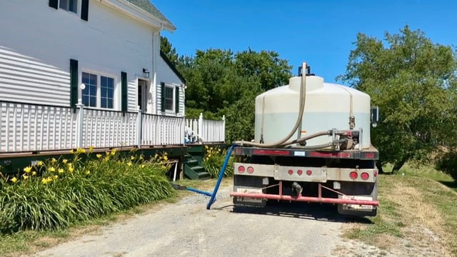 Some residents with dry wells have been relying on water truck deliveries.