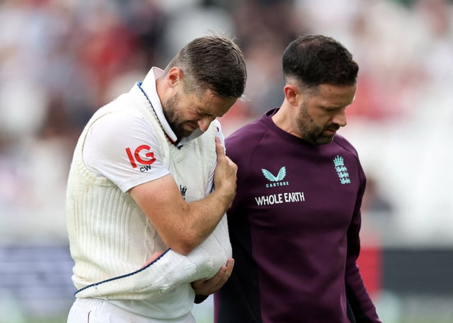 Cricket - International Test Match Series - Fifth Test - England v India - Kia Oval, London, Britain - July 31, 2025 England's Chris Woakes reacts as he leaves the field after sustaining an injury Action Images via Reuters/Paul Childs/File Photo