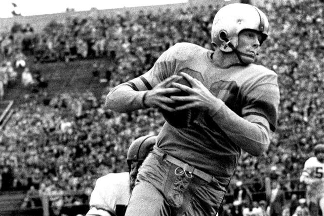 Wide receiver Billy Howton of the Green Bay Packers makes a catch during a game against the Philadelphia Eagles in Milwaukee, Wisconsin, on November 2, 1952.