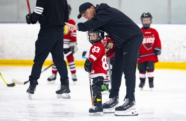 Former Blackhawks right wing Patrick Kane, right, skates around with his son, Patrick Kane III, and youth hockey players during on Aug. 8, 2025 at Johnny’s Ice House West. The City of Chicago officially named Aug. 8 Patrick Kane Day. (Dominic Di Palermo/Chicago Tribune)