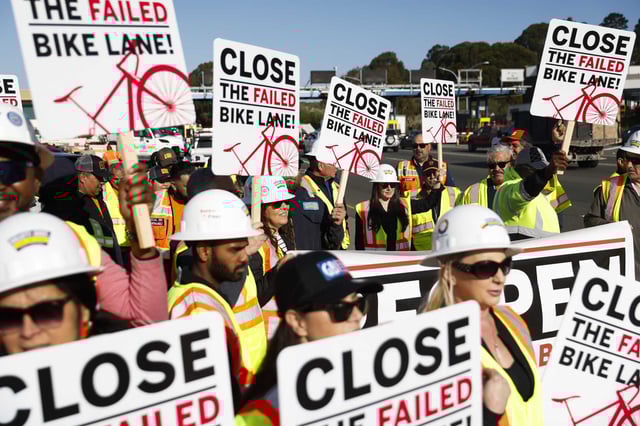 Local 261 members and business groups held a rally near the Richmond-San Rafael Bridge toll plaza during rush hour on May 14, 2025, to protest the bike lane, which they say is causing traffic jams.