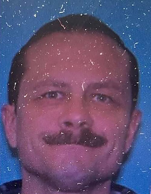 Montana Division of Criminal Investigation tells CNN the suspect authorities are searching for in connection with a deadly shooting in Anaconda is Michael Paul Brown.