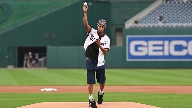 Aug 6, 2025; Washington, District of Columbia, USA; Washington Wizards first round pick Tre Johnson throws out the ceremonial first pitch before a game between the Washington Nationals and the Athletics at Nationals Park. Mandatory Credit: Rafael Suanes-Imagn Images
