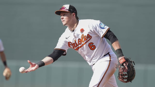 May 26, 2025; Baltimore, Maryland, USA; Baltimore Orioles first baseman Ryan Mountcastle (6) tosses the ball to Baltimore Orioles pitcher Seranthony Dominguez (56) (not pictured) to record an out against the St. Louis Cardinals during the seventh inning at Oriole Park at Camden Yards. Mandatory Credit: Gregory Fisher-Imagn Images