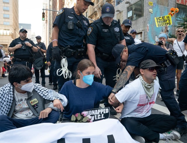 NYPD SRG officers arrest activists blocking Broadway outside the Jacob K. Javits Federal Office Building Friday, Aug. 8, 2025 in Manhattan, New York. (Barry Williams/ New York Daily News)