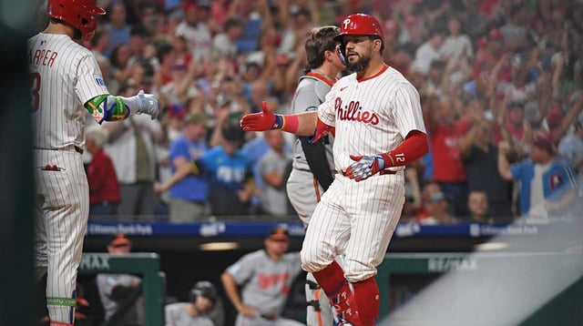 Aug 4, 2025; Philadelphia, Pennsylvania, USA; Philadelphia Phillies outfielder Kyle Schwarber (12) reacts after hitting a grand slam home run during the sixth inning against the Baltimore Orioles at Citizens Bank Park. Mandatory Credit: Eric Hartline-Imagn Images