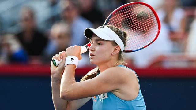 Aug 6, 2025; Montreal, QC, Canada; Elena Rybakina (KAZ) tracks her shot against Victoria Mboko (CAN) in semifinal play at IGA Stadium. Mandatory Credit: David Kirouac-Imagn Images