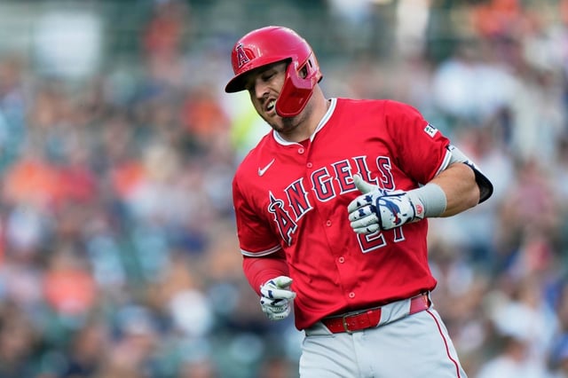 Angels designated hitter Mike Trout reacts after lining out to Detroit Tigers third baseman Zach McKinstry during the first inning of a baseball game, Friday, Aug. 8, 2025, in Detroit. (AP Photo/Ryan Sun)