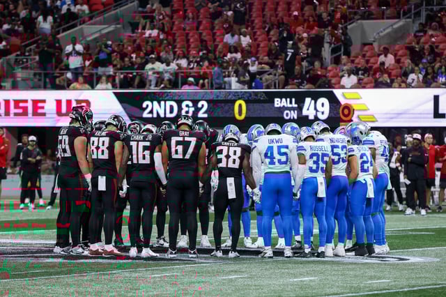 Aug 8, 2025; Atlanta, Georgia, USA; Atlanta Falcons and Detroit Lions players pray after an injury to safety Morice Norris (not pictured) in the fourth quarter at Mercedes-Benz Stadium. Mandatory Credit: Brett Davis-Imagn Images