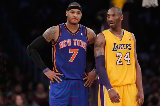 Carmelo Anthony #7 of the New York Knicks and Kobe Bryant #24 of the Los Angeles Lakers talk during the first half at Staples Center on December 29, 2011 in Los Angeles, California.