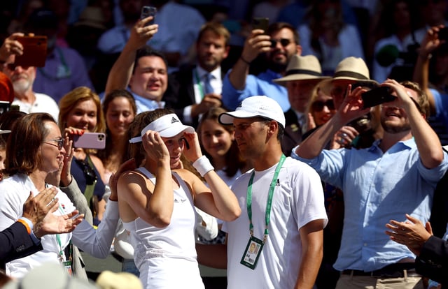 Tennis - Wimbledon - All England Lawn Tennis and Croquet Club, London, Britain - July 9, 2022  Kazakhstan's Elena Rybakina celebrates with coach Stefano Vukov after winning the women's singles final against Tunisia's Ons Jabeur REUTERS/Hannah Mckay/File Photo
