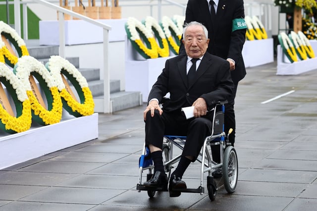 Hiroshi Nishioka, 93, a survivor of the 1945 Nagasaki atomic bombing, looks on after delivering a speech on the day of a ceremony commemorating the 80th anniversary of the bombing of the city, at Nagasaki's Peace Park in Nagasaki, southwestern Japan, August 9, 2025.  REUTERS/Issei Kato