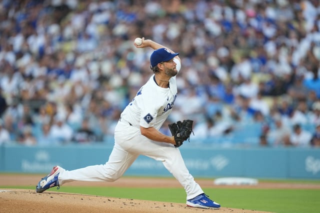 Aug 8, 2025; Los Angeles, California, USA; Los Angeles Dodgers starting pitcher Clayton Kershaw (22) pitches the ball during the first inning against Toronto Blue Jays at Dodger Stadium. Mandatory Credit: Kirby Lee-Imagn Images