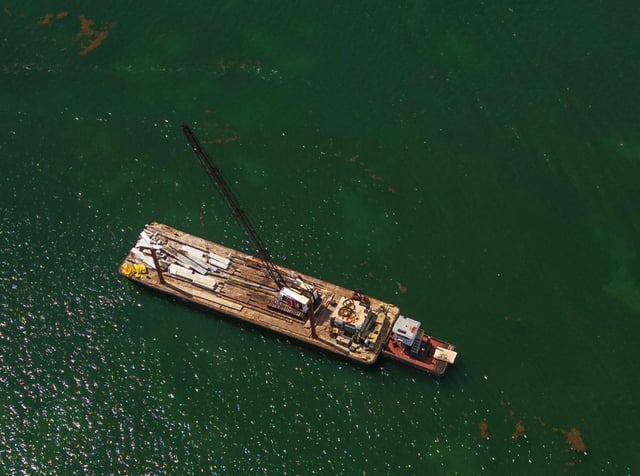 View of a barge that hit a sailboat that sank off Miami Beach’s Hibiscus Island in Biscayne Bay on July 28, 2025. (Pedro Portal/Miami Herald/TNS)