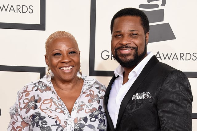 LOS ANGELES, CA - FEBRUARY 08:  Actor Malcolm-Jamal Warner (R) and Pamela Warner attend The 57th Annual GRAMMY Awards at the STAPLES Center on February 8, 2015 in Los Angeles, California.  (Photo by Steve Granitz/WireImage)