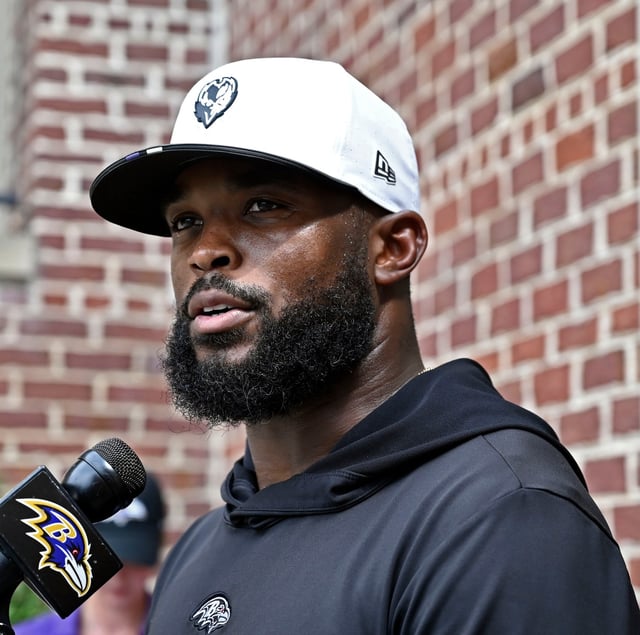 Ravens defensive coordinator Zach Orr speaks with media after training camp work out at Under Armour Performance Center. (Kenneth K. Lam/staff)