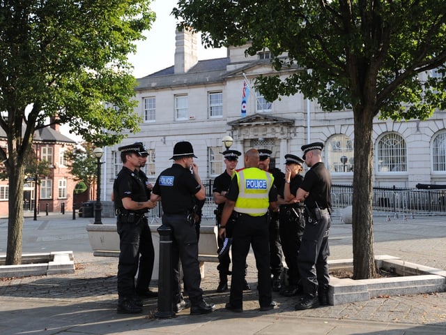 ROTHERHAM, ENGLAND - SEPTEMBER 11: Police presence are seen outside as Shaun Wright, Police and Crime Commissioner of South Yorkshire attends a South Yorkshire Police and Crime Panel meeting at Rotherham Town Hall on September 11, 2014 in Rotherham, England. Shaun Wright was a council cabinet member with responsibility for children's services in Rotherham from 2005 to 2010, in the middle of a 16-year period when 1,400 youngsters suffered wide scale sexual exploitation. He has faced calls to resign from the Home Secretary Theresa May and Deputy Prime Minister Nick Clegg. (Photo by Anna Gowthorpe/Getty Images)