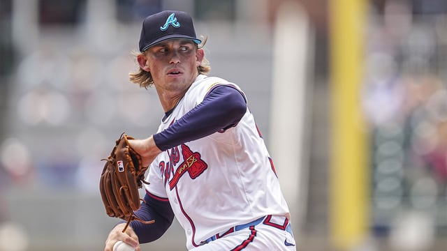 Jun 16, 2024; Cumberland, Georgia, USA; Atlanta Braves starting pitcher Hurston Waldrep (30) pitches against the Tampa Bay Rays during the first inning at Truist Park. Mandatory Credit: Dale Zanine-Imagn Images.