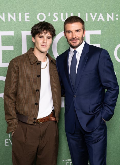 Cruz Beckham and David Beckham attend the "Ronnie O'Sullivan: The Edge of Everything" Premiere at Odeon West End.