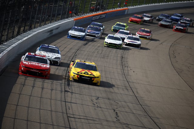 Jesse Love, driver of the #2 Whelen Chevrolet, and Connor Zilisch, driver of the #88 KOA Chevrolet, lead the field during the NASCAR Xfinity Series HyVee Perks 250 at Iowa Speedway on August 02, 2025 in Newton, Iowa.