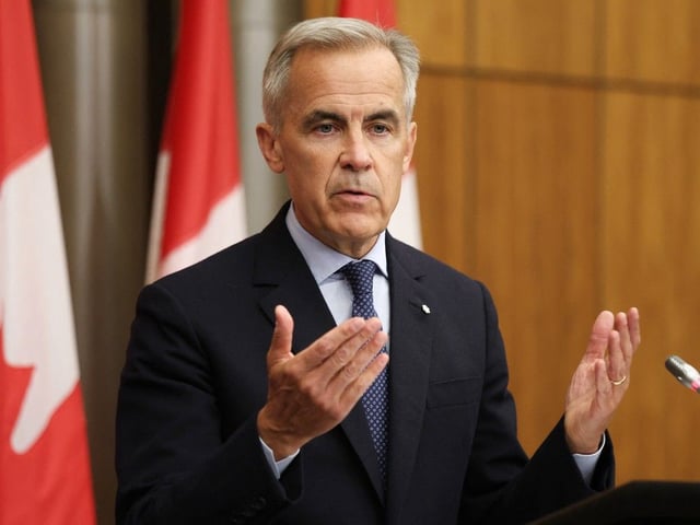 Canadian Prime Minister Mark Carney speaks during a press conference after a Cabinet meeting to discuss both trade negotiations with the US and the situation in the Middle East, at the National Press Theatre in Ottawa, Ontario, Canada on July 30, 2025. 