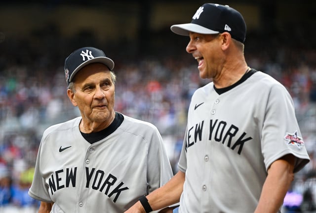 ATLANTA, GEORGIA - JULY 15: Former manager of the New York Yankees Joe Torre and Aaron Boone #17 of the New York Yankees laugh before the MLB All-Star Game at Truist Park on July 15, 2025 in Atlanta, Georgia.