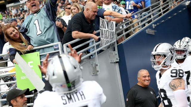 Geno Smith and Maxx Crosby of the Raiders faced backlash after flipping off Seahawks fans during a preseason game. (Photo by Steph Chambers / GETTY IMAGES NORTH AMERICA / Getty Images via AFP)