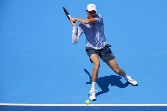 Aug 9, 2025; Cincinnati, OH, USA; Jannik Sinner (ITA) returns a shot against Daniel Elahi Galan (COL) during the Cincinnati Open at the Lindner Family Tennis Center. Mandatory Credit: Aaron Doster-Imagn Images