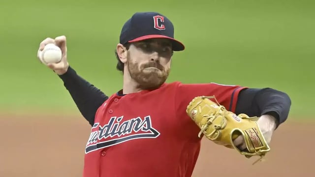 Sep 27, 2023; Cleveland, Ohio, USA; Cleveland Guardians starting pitcher Shane Bieber (57) delivers a pitch in the first inning against the Cincinnati Reds at Progressive Field. Mandatory Credit: David Richard-USA TODAY Sports