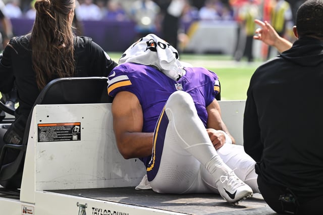Aug 9, 2025; Minneapolis, Minnesota, USA; Minnesota Vikings wide receiver Rondale Moore (4) is carted off the field after suffering a lower leg injury during the second quarter against the Houston Texans at U.S. Bank Stadium. Mandatory Credit: Jeffrey Becker-Imagn Images