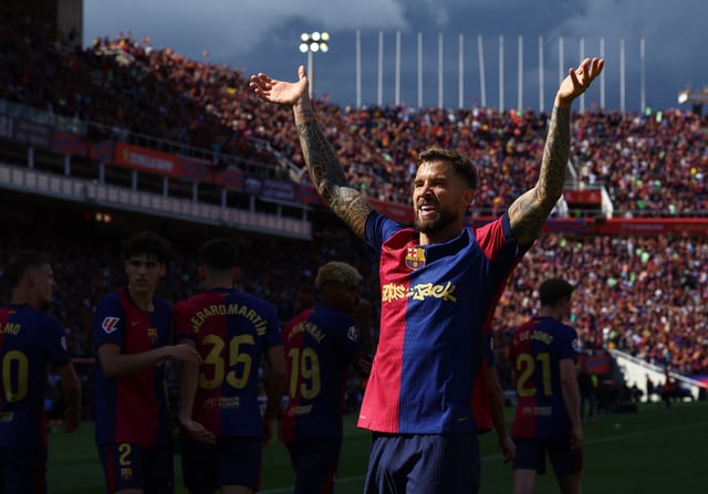Soccer Football - LaLiga - FC Barcelona v Real Madrid - Estadi Olimpic Lluis Companys, Barcelona, Spain - May 11, 2025 FC Barcelona's Inigo Martinez celebrates after Raphinha scores their third goal REUTERS/Albert Gea/File Photo