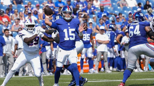 Aug 9, 2025; Orchard Park, New York, USA; New York Giants quarterback Tommy DeVito (15) throws the ball against the Buffalo Bills during the second half at Highmark Stadium. Mandatory Credit: Gregory Fisher-Imagn Images
