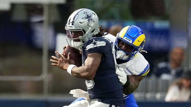 Dallas Cowboys quarterback Joe Milton III (10) is sacked by Los Angeles Rams linebacker Josaiah Stewart (41) in the first half at SoFi Stadium. Mandatory Credit: Kirby Lee-Imagn Images